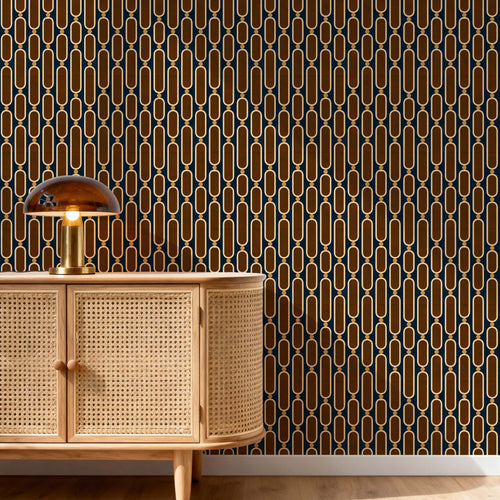 May include: A cabinet with a light-colored woven cane front and a rounded side, topped with a dome-shaped glass lamp. The wall behind features a repeating geometric pattern of vertical gold-colored ovals linked by small circles on a dark background.